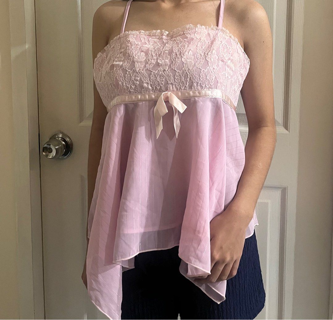 vintage pink lace bow top (Category: Others Tops) located in Tuguegarao City. Submitted by noellestyles (Listing ID 1411359987, Image 1). Description: FREE SF AROUND LUZON fits small - medium! very nice in actual perfect for coquette girlies 🎀 has zipper closure in the side can give discount for sure buyer!!! dm for when worn ⛲️🔆 🏷️ vintage coquette top pink top zara h&m cotton on vintage top lace top.