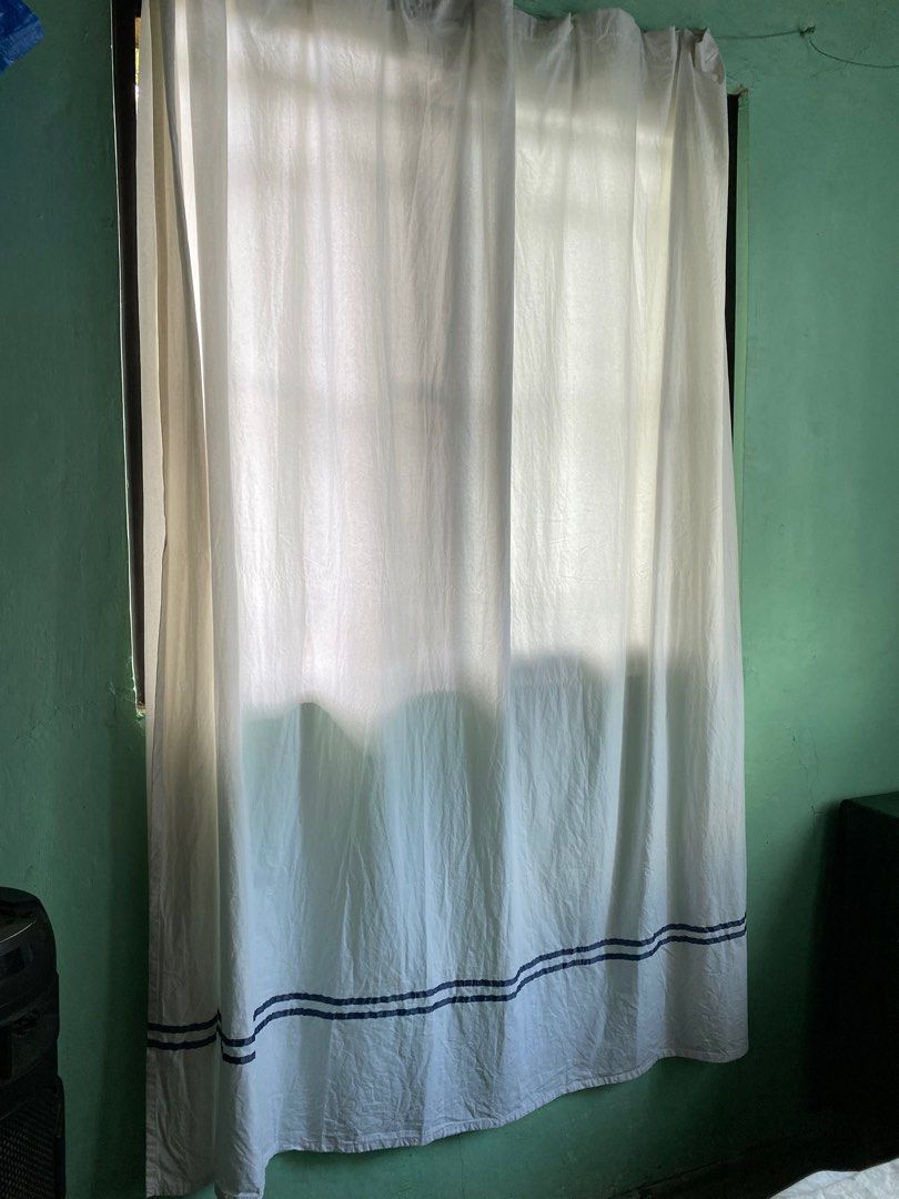 White Curtain with Blue Stripes (Category: Curtains & Blinds) located in Taguig. Submitted by indaysukaycloset (Listing ID 1411326056, Image 2). Description: - White curtain with blue stripes - Made of light fabric - Features a tie-up design - Ideal for windows -2 pcs pair .