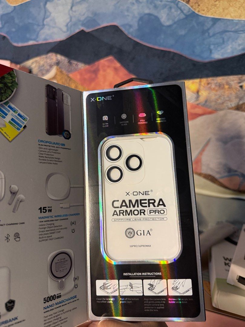 X-ONE CAMERA LENS PROTECTOR FOR 16 PRO MAX (Category: Cases & Sleeves) located in Quezon City. Submitted by cinnabutteroll (Listing ID 1411342296, Image 2). Description: X-ONE CAMERA LENS PROTECTOR FOR 16 PRO MAX • used once, still sticky • comes with original packaging and inclusions .