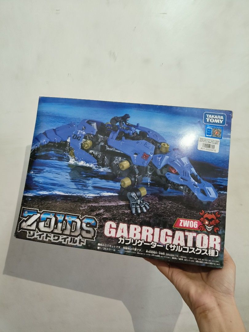 Zoids Gabrigator ZW06 (Category: Gundam & Model Kits) located in Valenzuela. Submitted by onhoco (Listing ID 1411420552, Image 2). Description: 𝐅𝐨𝐫 𝐝𝐢𝐬𝐩𝐥𝐚𝐲 𝐩𝐮𝐫𝐩𝐨𝐬𝐞𝐬 𝐨𝐧𝐥𝐲. 𝐅𝐫𝐞𝐞 𝐛𝐚𝐭𝐭𝐞𝐫𝐢𝐞𝐬 𝐢𝐧𝐜𝐥𝐮𝐝𝐞𝐝 𝐢𝐧𝐬𝐢𝐝𝐞 𝐭𝐡𝐞 𝐛𝐨𝐱 𝐦𝐚𝐲 𝐧𝐨 𝐥𝐨𝐧𝐠𝐞𝐫 𝐛𝐞 𝐟𝐮𝐧𝐜𝐭𝐢𝐨𝐧𝐚𝐥. - Zoids Gabrigator ZW06 model kit - Features a blue, crocodile-like Zoid - Manufactured by Takara Tomy - Box art depicts a water envi