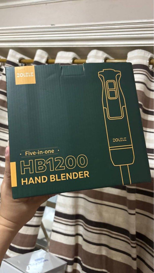 ZOLELE 5-in-1 HB1200 Hand Blender (Category: Hand & Stand Mixers) located in Paranaque City. Submitted by pcookie (Listing ID 1411409451, Image 1). Description: Model: HB1200 1200W all-copper motor, 8-speed + turbo pulse, 15,000 RPM. Includes immersion wand, whisk, chopper, juicer attachment; stainless steel blades, BPA-free, dishwasher-safe .