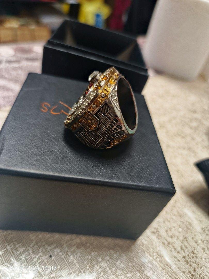 2016 Cleveland Cavaliers Championship Ring (Category: Rings) located in Baguio. Submitted by 01blaze (Listing ID 1411488524, Image 3). Description: Ring commemorates the 2016 Cleveland Cavaliers championship. It features the team logo and the year "2016" on the ring. The ring is presented in a black box. The ring has a gold and silver color scheme with multiple stones..