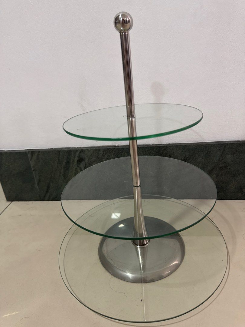 3-Tier Glass Cake Stand (Category: Other Kitchenware & Tableware) located in Manila. Submitted by decluterthings888 (Listing ID 1411517357, Image 2). Description: - 3-tier cake stand - Stainless steel pole and base - Clear glass tiers (various sizes) - Perfect for desserts and pastries - Stable and visually appealing - Great for parties and home use.