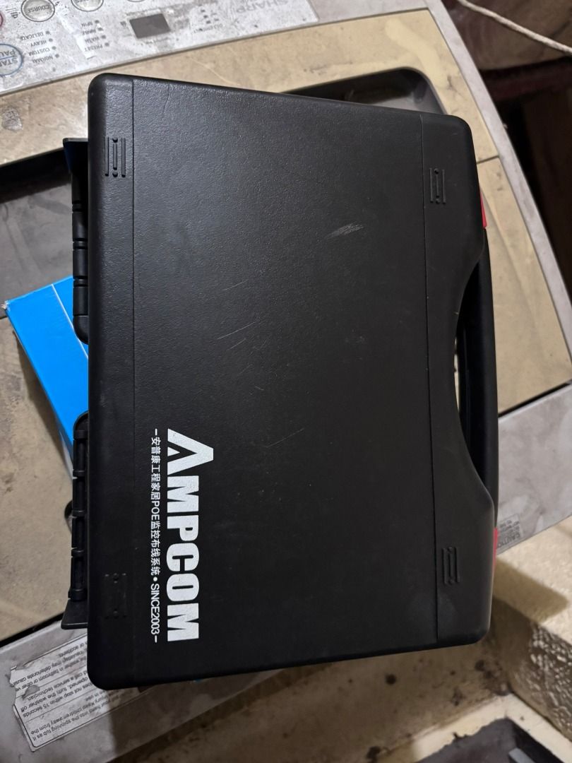 AMPCOM Network Tool Kit / Crimping Tools (Category: Networking) located in Manila. Submitted by hawker_techxx317 (Listing ID 1411512712, Image 2). Description: - Complete AMPCOM network tool kit. - Includes crimping tool, wire stripper, and punch-down tool. - Comes with various connectors. - Convenient black carrying case for storage and transport. - Ideal for professional and DIY network projects. tool for RJ45/RJ11/RJ12 connectors, a network ca