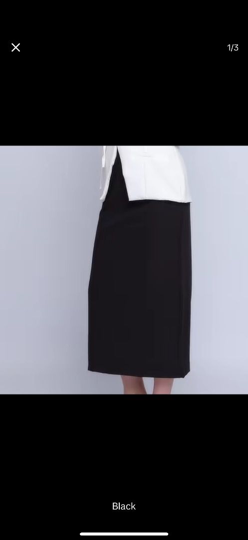 BM SUIT Black Midi Skirt (Category: Skirts) located in Valenzuela. Submitted by raquesells (Listing ID 1411518134, Image 1). Description: - Black midi skirt - Smooth fabric - Straight cut - Mid-calf length - Versatile style - Perfect for work or casual outfits - never worn, without tags.