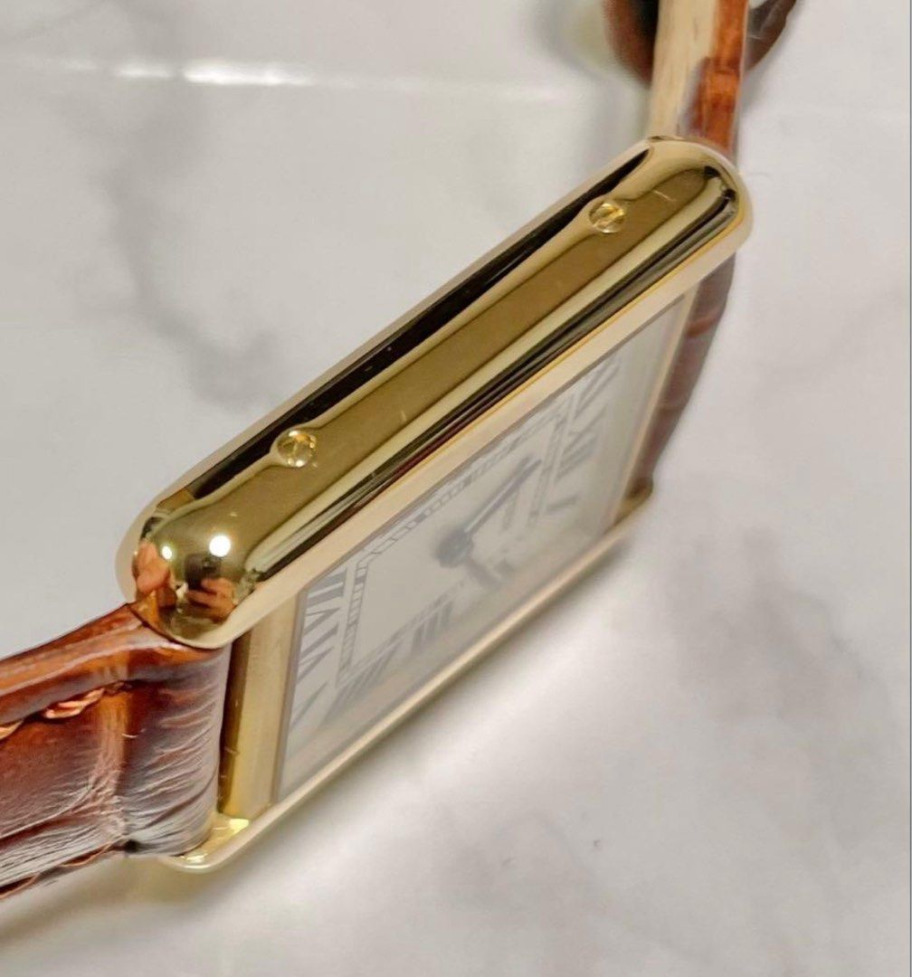 Cartier Tank Solo 18k (Category: Luxury Watches) located in Bulacan. Submitted by youlovewatches (Listing ID 1411575378, Image 2). Description: Cartier Tank Solo 18k Ladies Ref #: W5200002 Movement: Quartz Material: Case: K18YG (yellow gold) x SS (stainless steel) Size: Length: 31mm (including lug) Width: 24mm (excluding crown) Thickness: 5.5mm Set with: Original box and manual Pre-order 7-10 days Meet-up Sm Baliwag / Trinoma LBC Cod Nationwide.