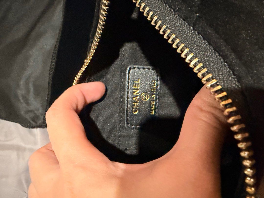 GWP Chanel Black Quilted Chain Bag 💯Authentic (Category: Luxury Bags & Wallets) located in Cebu City. Submitted by greatstuffshopper (Listing ID 1411474834, Image 3). Description: - Black quilted handbag - Gold chain strap - Gold zipper - Crystal-embellished Chanel logo - Crescent shape - Black lining - "Made in Italy" label - Includes dust bag.