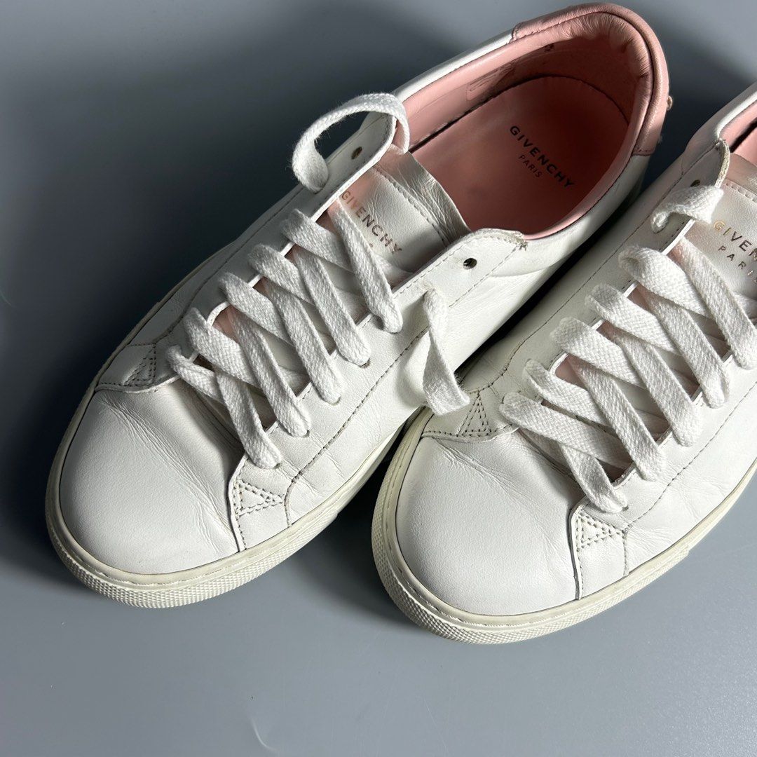 Givenchy Paris Urban Street Sneakers (Category: Sneakers & Footwear) located in Cavite. Submitted by datsoretro (Listing ID 1411601857, Image 2). Description: - White leather upper - Pink interior and heel tab - White laces and sole - Givenchy Paris logo detailing - Size 36 - Made in Portugal - Visible heel drags, creases, etc. No major flaws. .