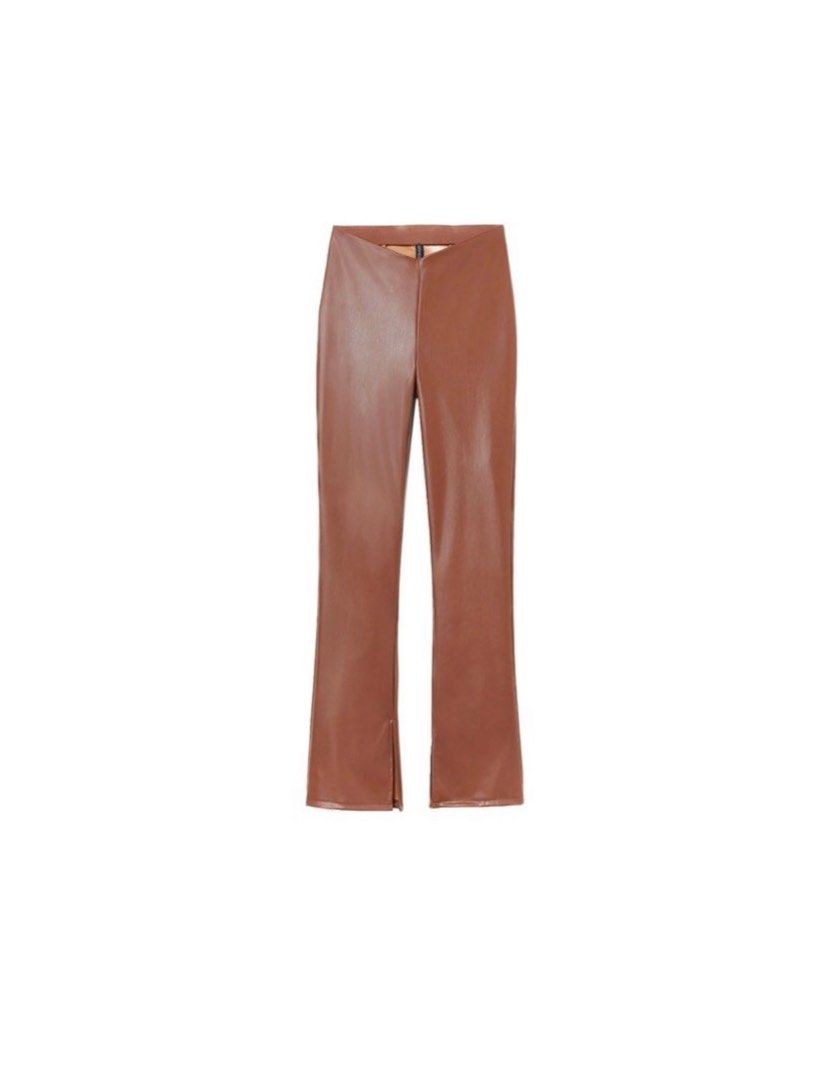 H&M Divided Faux Leather Pants (Category: Jeans) located in Bulacan. Submitted by eggydibs (Listing ID 1411471325, Image 2). Description: - H&M Divided faux leather pants - Color: Brown - Size: 4 - Style: High-waisted, flared - Features: Split hem - Material: Smooth faux leather.