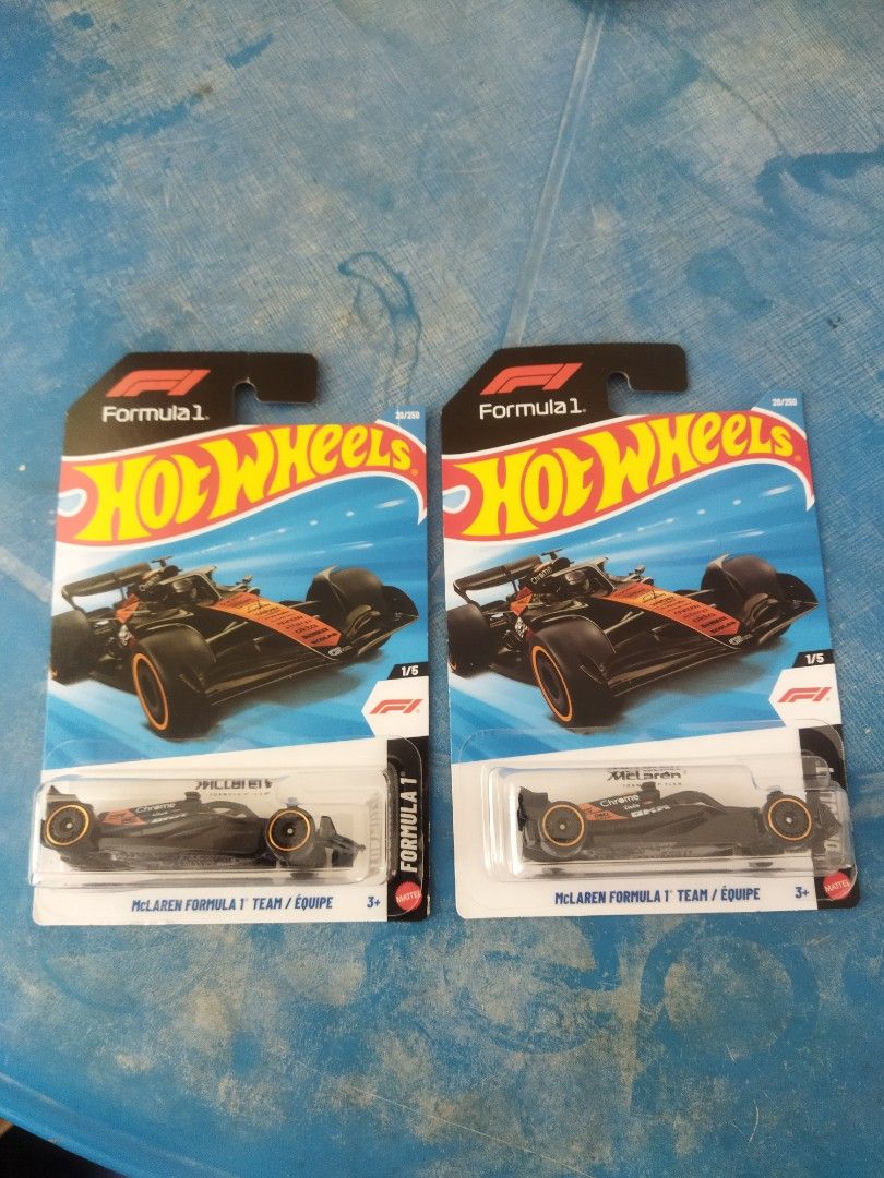 Hot Wheels McLaren Formula 1 Team (Category: Vehicle & Diecast Models) located in Cagayan de Oro. Submitted by carsmyboy009 (Listing ID 1411467228, Image 1). Description: - Two Hot Wheels McLaren Formula 1 diecast cars - Black with orange accents - Original packaging included - Features Hot Wheels and Formula 1 branding - 1/6 scale models PM FOR MORE INFO.