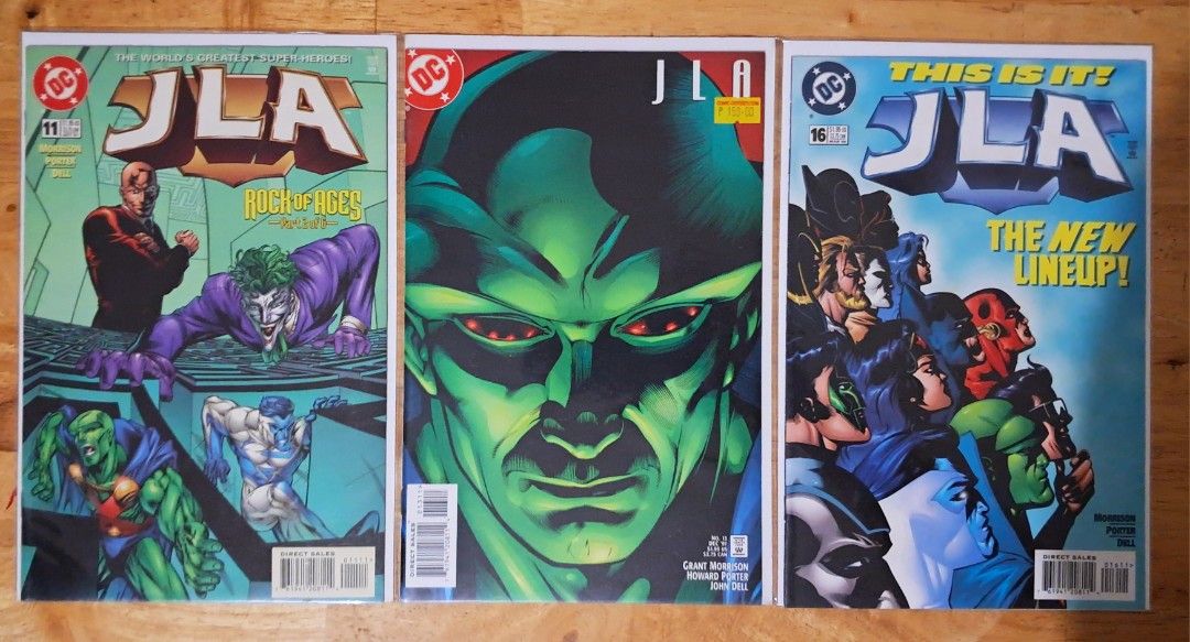 JLA Comic Book Lot (Category: Comics & Manga) located in Quezon City. Submitted by ernestamaru2 (Listing ID 1411551660, Image 1). Description: Lot of three JLA comic books. Includes issues 11,13 and 16. Features various characters including The Joker, Martian Manhunter, and the Justice League. Perfect for comic book collectors and fans of DC Comics. Great addition to any collection..