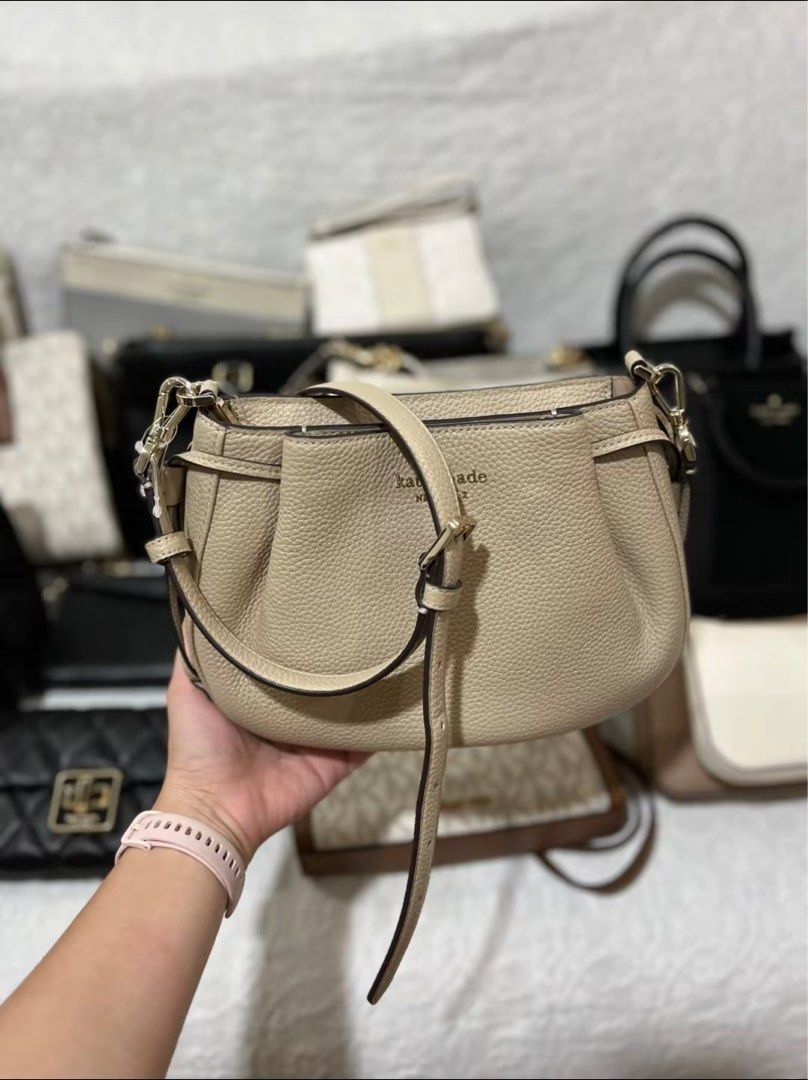 Kate Spade Dumpling Crossbody (Category: Luxury Bags & Wallets) located in Manila. Submitted by auraa.pieces (Listing ID 1411492283, Image 3). Description: Kate Spade Dumpling Crossbody 🤎👜 Color: Light Sand Size: approx. 10” W (bottom) x 7.2” H x 3.0” D Material: Soft pebbled leather Condition: Brand new with tags All details and style are shown in the photos. 100% guaranteed authentic — money back if proven otherwise. Message us for price and 