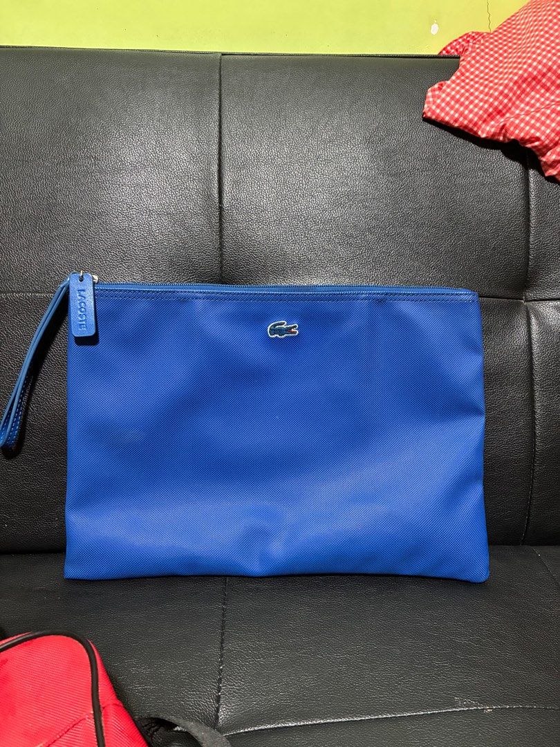 LACOSTE BAGS as pack (Category: Luxury Bags & Wallets) located in Quezon City. Submitted by jasmine_david (Listing ID 1411499502, Image 3). Description: Vintage lacoste clutch and shoulder bag declucttering.