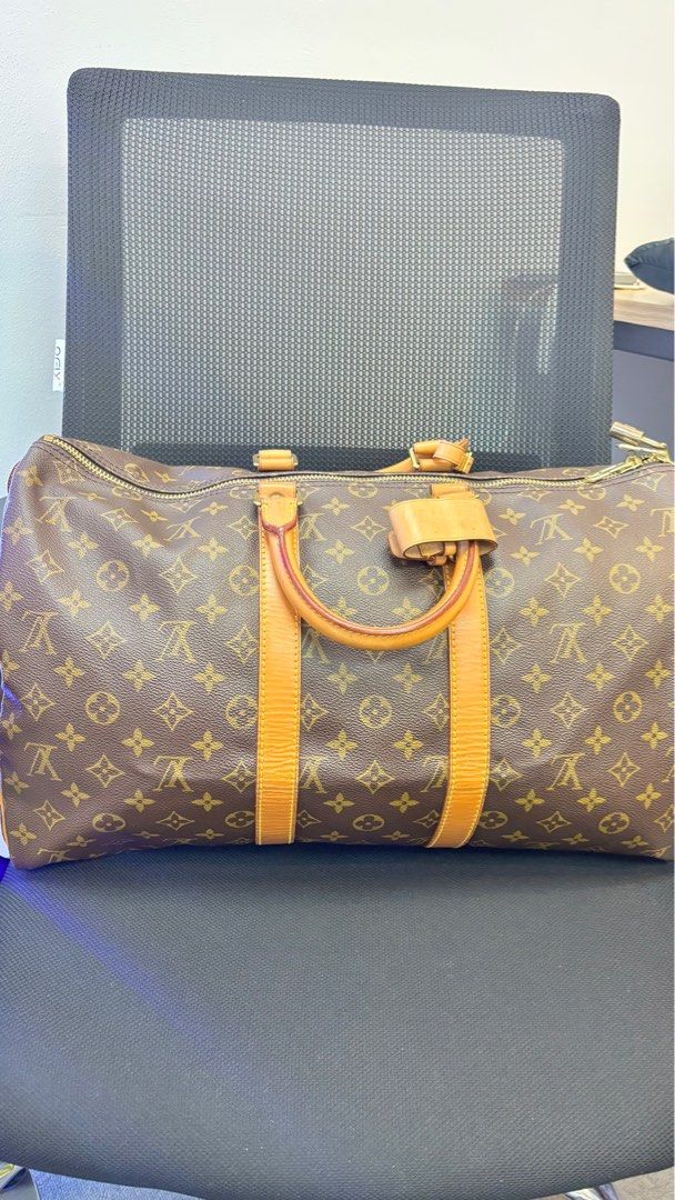 LOUIS VUITTON Keepall 45 Monogram Canvas Travel Bag (Category: Luxury Bags & Wallets) located in Taguig. Submitted by shoppersluxe2394 (Listing ID 1411467031, Image 1). Description: .