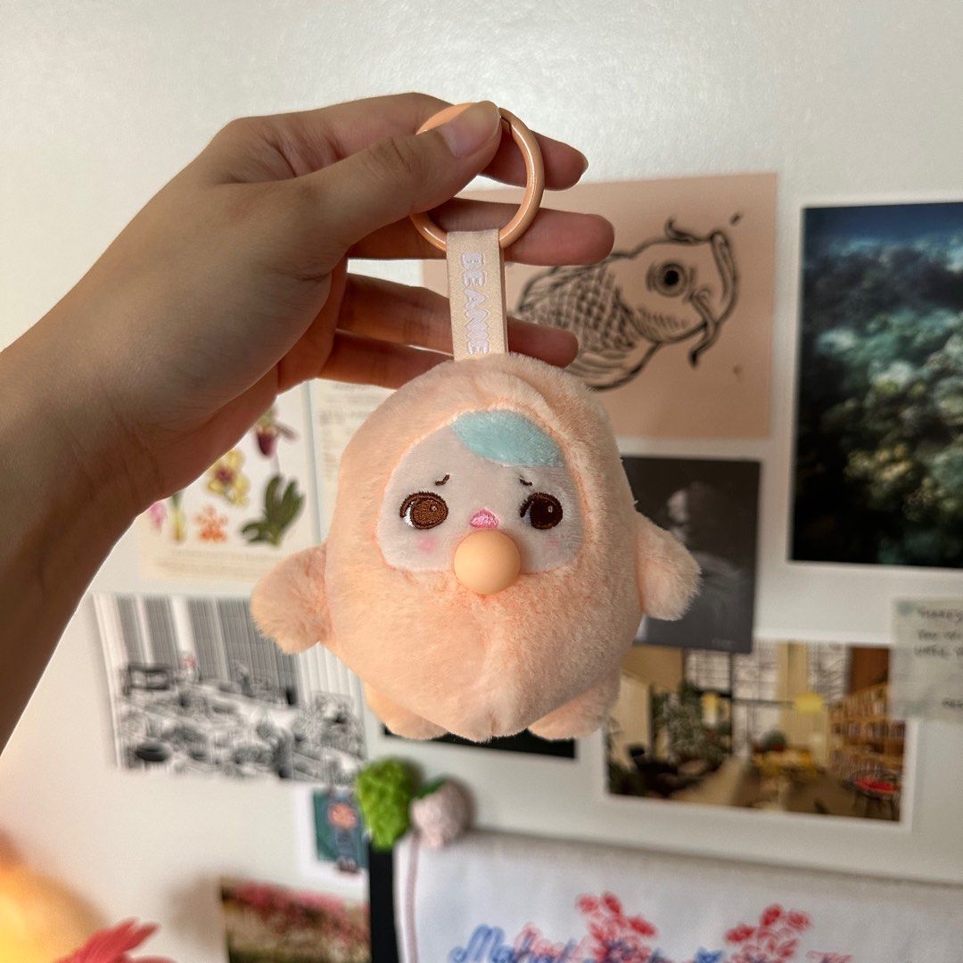Pucky Beanie Bubble Plush Keychain - Orange (Category: Plushies & Soft Toys) located in Paranaque City. Submitted by yjulianna (Listing ID 1411530690, Image 2). Description: - good as new, used 2-3 times - bought from popmart korea 🇰🇷 - no box (unboxed there na) - no issues 📍location: Parañaque City / UST mnl 💵 MOP: Gcash / BDO 📦 MOD: Lalamove, Grab, Toktok, Borzo, J&T, GogoExpress, or any courier of your choice. :).