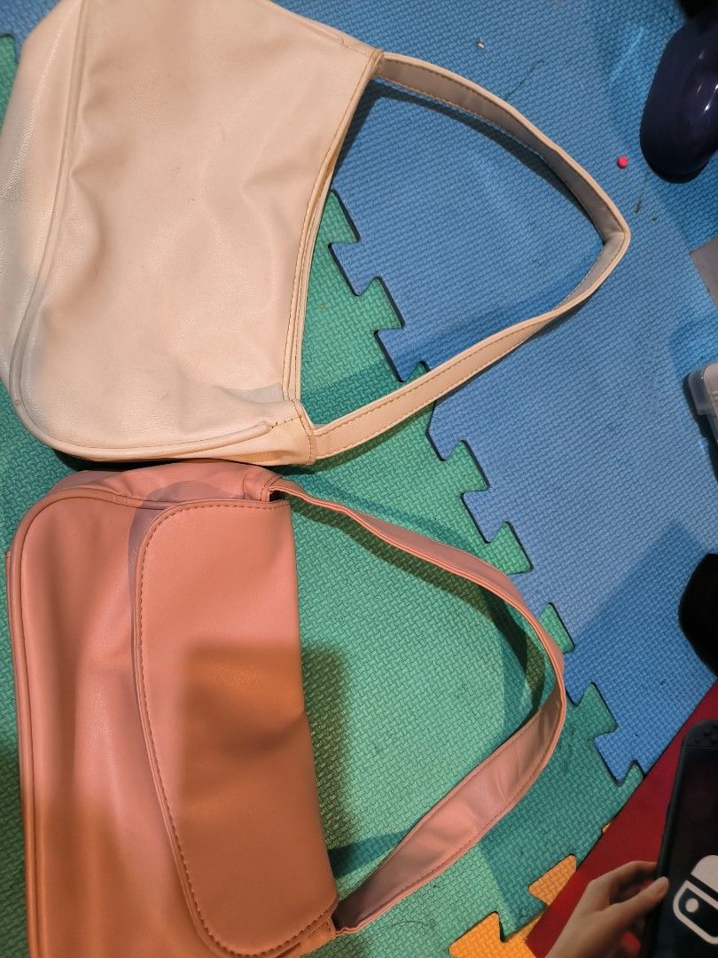 Shoulder Bag - Pink and White FOR FREE (Category: Shoulder Bags) located in Manila. Submitted by kimcath (Listing ID 1411598899, Image 1). Description: still in good condition! - Stylish shoulder bags in pink and white - Features a curved design - Single shoulder strap - Made of smooth material - Perfect for everyday or night use - Available in two colors Decluttering Shipping shouldered by miner.