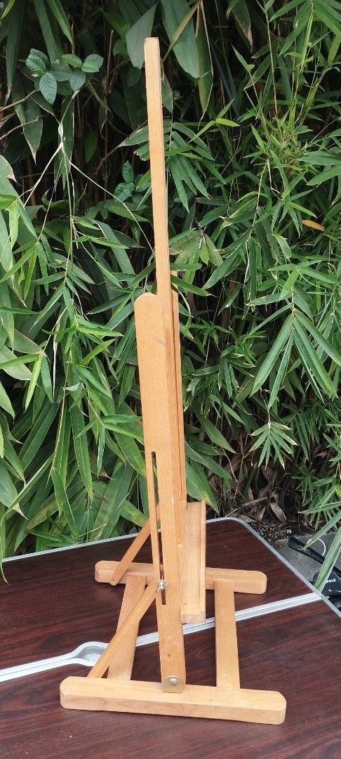 Wooden Easel (Category: Art & Prints) located in Malabon City. Submitted by immortalpicker (Listing ID 1411607727, Image 2). Description: Adjustable wooden painting stand for indoor or outdoor NO to COD NO swapping Estimate size Open H= 36 inches Painting holder H= 29 1/2 inches Folded size H= 4 inches L= 40 3/4 Inches W= 13 1/4 inches Color = wood Material = wood from Japan 2nd hand with scratch No warranty If there's Damage or Issues they can b