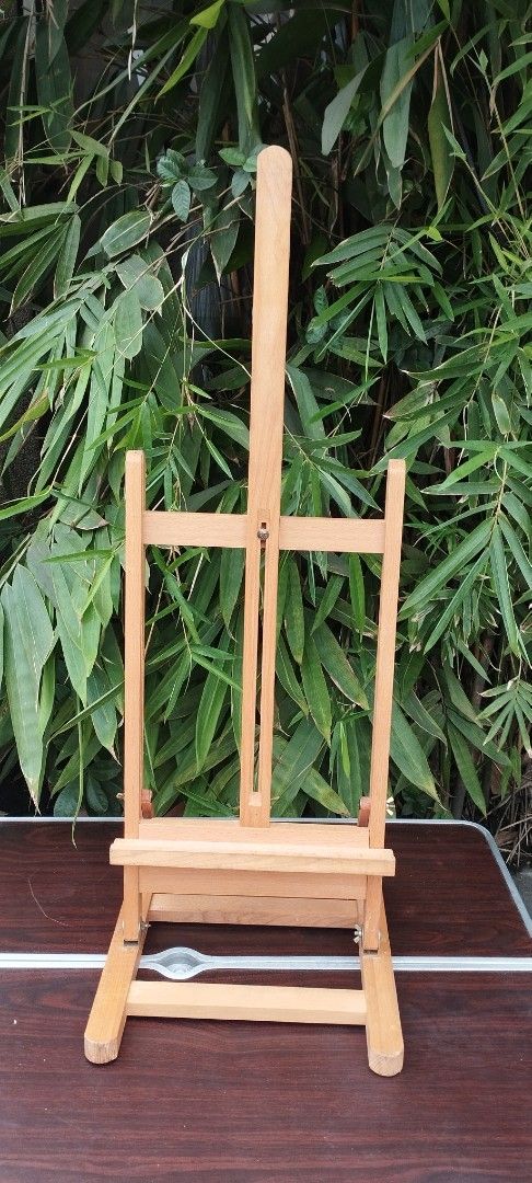 Wooden Easel (Category: Art & Prints) located in Malabon City. Submitted by immortalpicker (Listing ID 1411607727, Image 1). Description: Adjustable wooden painting stand for indoor or outdoor NO to COD NO swapping Estimate size Open H= 36 inches Painting holder H= 29 1/2 inches Folded size H= 4 inches L= 40 3/4 Inches W= 13 1/4 inches Color = wood Material = wood from Japan 2nd hand with scratch No warranty If there's Damage or Issues they can b