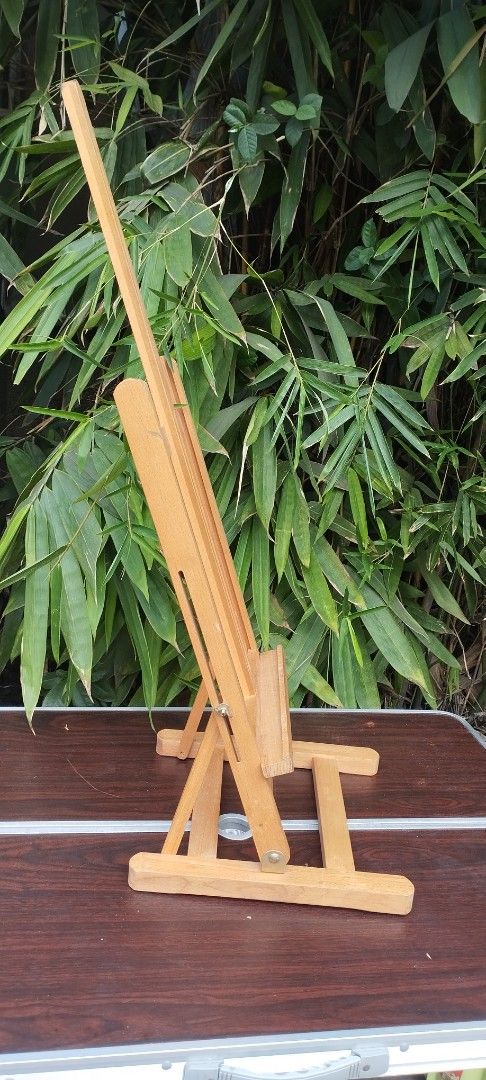 Wooden Easel (Category: Art & Prints) located in Malabon City. Submitted by immortalpicker (Listing ID 1411607727, Image 3). Description: Adjustable wooden painting stand for indoor or outdoor NO to COD NO swapping Estimate size Open H= 36 inches Painting holder H= 29 1/2 inches Folded size H= 4 inches L= 40 3/4 Inches W= 13 1/4 inches Color = wood Material = wood from Japan 2nd hand with scratch No warranty If there's Damage or Issues they can b
