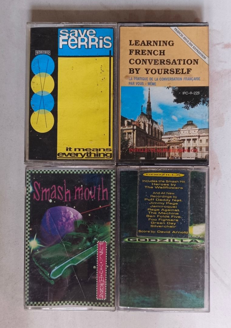Assorted Music Cassette Tapes (Category: CDs & DVDs) located in Cavite. Submitted by zelcastillo (Listing ID 1411677529, Image 3). Description: Collection of assorted music cassette tapes featuring various artists and soundtracks. Includes titles like Foo Fighters, The Cranberries, Adam Sandler's The Waterboy, and more. Some tapes are from the MTV Alternative Nation series and movie soundtracks such as Batman Forever and Godzilla. Also includes b