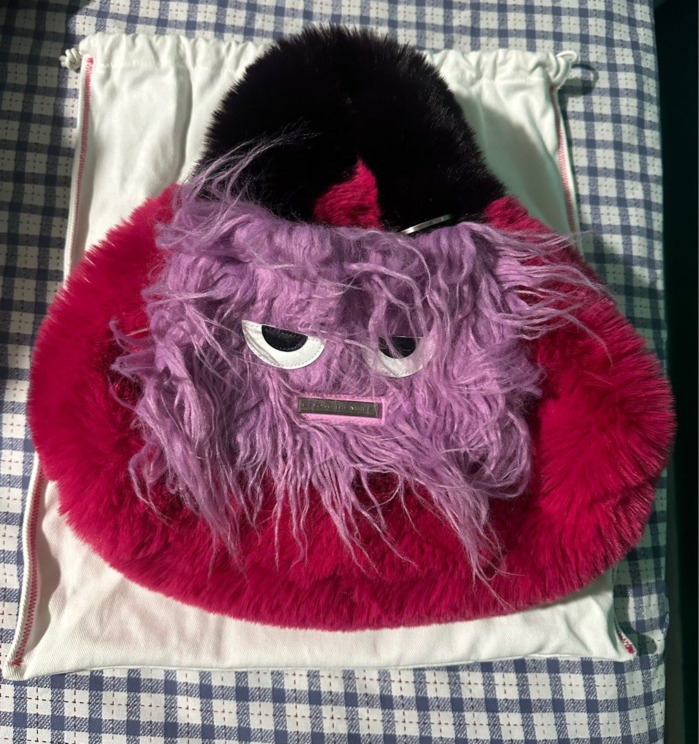 Beyond The Vines Monsters Colourblock Dumpling Bag (Category: Cross-body Bags) located in Quezon City. Submitted by declutterwithtin (Listing ID 1411754888, Image 1). Description: - Special Edition Monsters Bag from BTV - used twice - bought it frm SG - complete inclusions. .