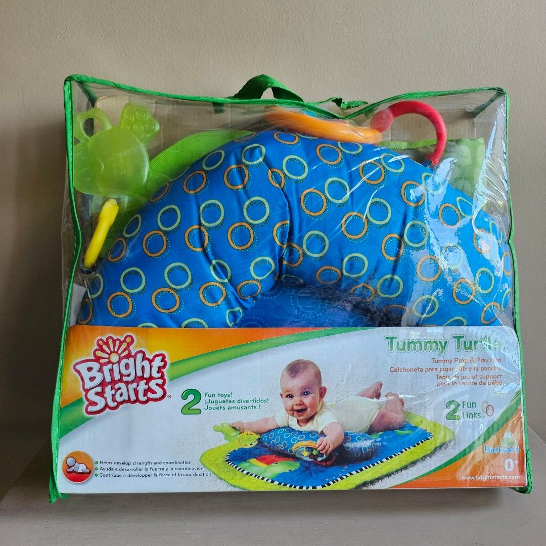 Bright Starts Tummy Turtle Play Mat (Category: Infant Playtime) located in Marikina City. Submitted by rsmade (Listing ID 1411700613, Image 1). Description: Bright Starts Tummy Turtle play mat with a blue and green design. Includes a supportive pillow for tummy time and detachable toys. This compact mat gives baby a comfy space to stretch out whether you're at home or away. With 2 newborn toys included, tummy time is play time! Little ones love s