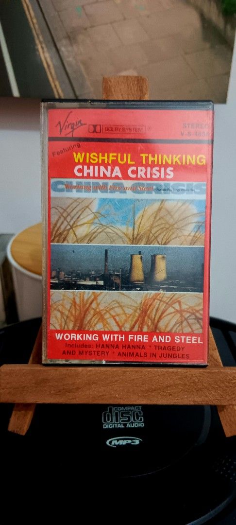 China Crisis - Wishful Thinking Cassette Tape (Category: CDs & DVDs) located in Manila. Submitted by dsinuto (Listing ID 1411780270, Image 1). Description: - China Crisis "Wishful Thinking" cassette tape - Features tracks: "Working With Fire And Steel", "Hanna Hanna", "Animals In Jungles" - Virgin Records release - Track list included - Original case.