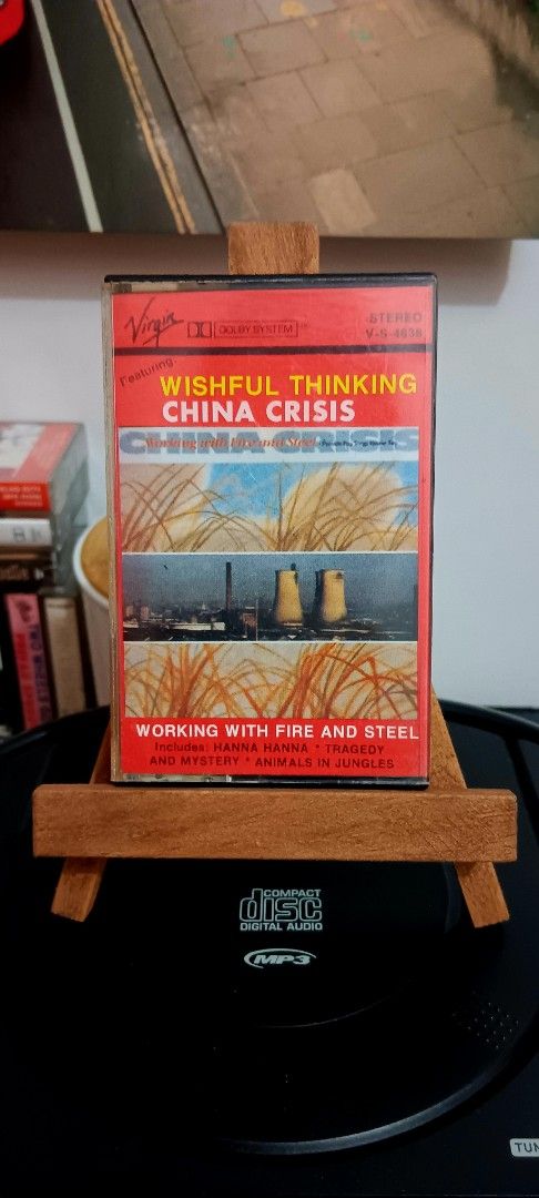 China Crisis - Wishful Thinking Cassette Tape (Category: CDs & DVDs) located in Manila. Submitted by dsinuto (Listing ID 1411780270, Image 2). Description: - China Crisis "Wishful Thinking" cassette tape - Features tracks: "Working With Fire And Steel", "Hanna Hanna", "Animals In Jungles" - Virgin Records release - Track list included - Original case.