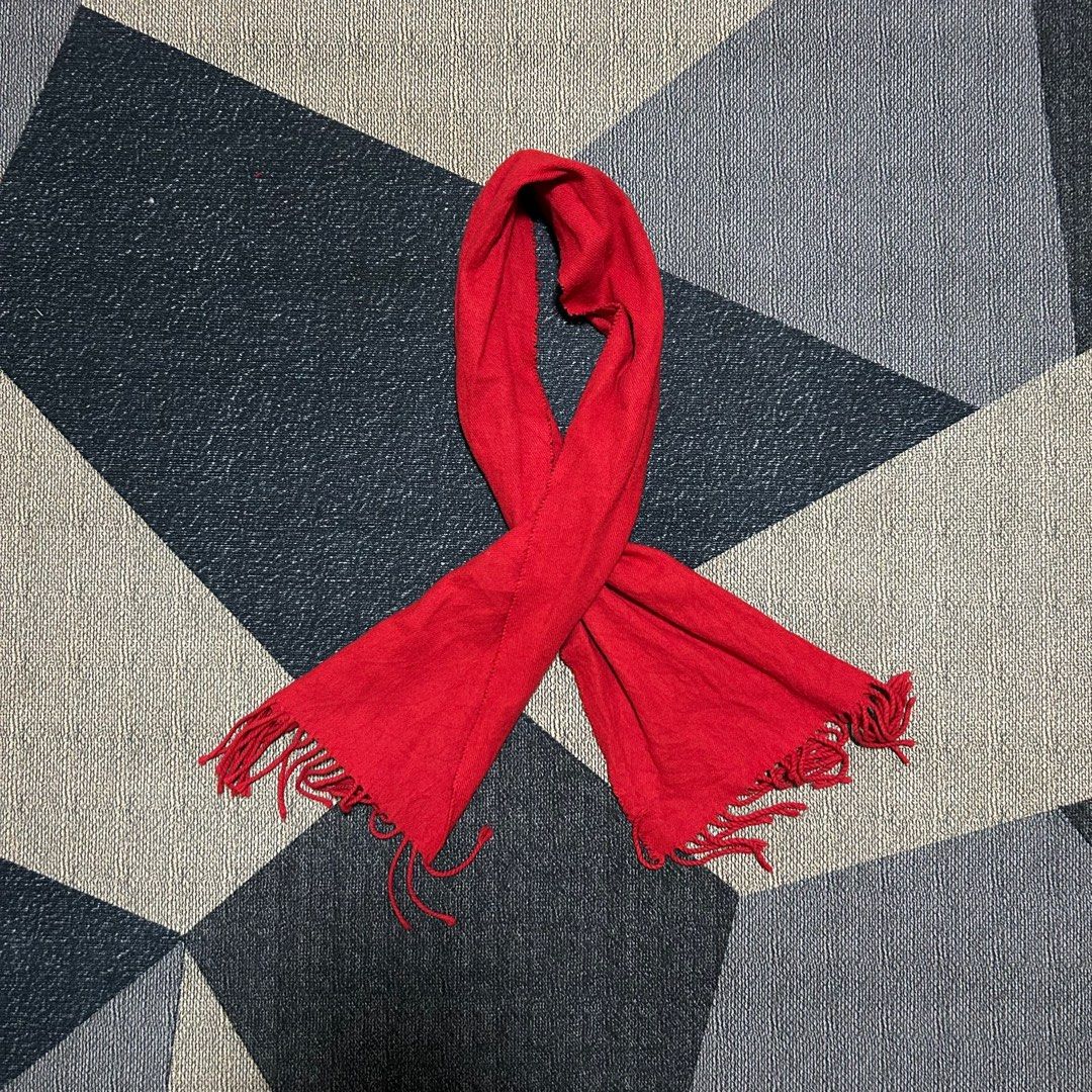 Classic Crimson Tassel Scarf (Category: Scarves) located in Cabuyao City. Submitted by joaquinb18 (Listing ID 1411744802, Image 2). Description: Classic Crimson Tassel Scarf Color: A deep, rich Crimson or Scarlet red Texture: fine-ribbed or twill weave Fringe/Tassels: The ends feature hand-twisted tassels. .