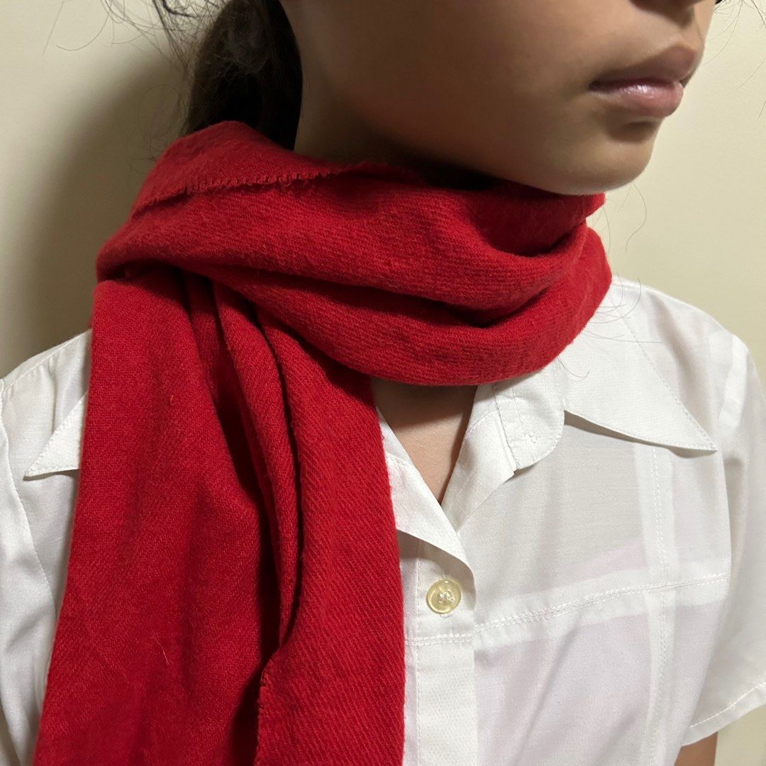 Classic Crimson Tassel Scarf (Category: Scarves) located in Cabuyao City. Submitted by joaquinb18 (Listing ID 1411744802, Image 3). Description: Classic Crimson Tassel Scarf Color: A deep, rich Crimson or Scarlet red Texture: fine-ribbed or twill weave Fringe/Tassels: The ends feature hand-twisted tassels. .