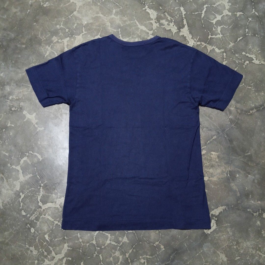 Comme des Garcons Play Navy T-shirt Single Stitch (Category: Shirts) located in Manila. Submitted by sangkalamsthrift88 (Listing ID 1411711643, Image 3). Description: - Navy blue Comme des Garcons Play T-shirt - Features the iconic heart eyes logo - Crew neck and short sleeves - Size: M.