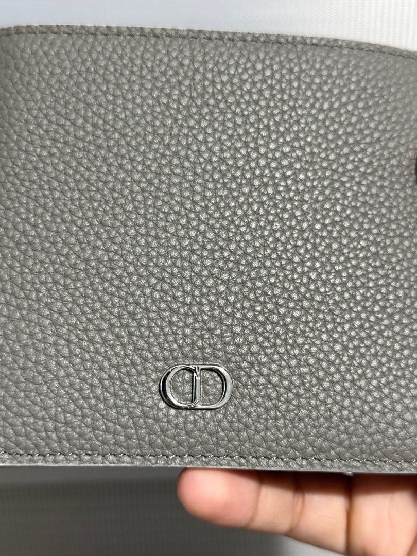 Dior Grained Calfskin CD Icon Bifold Wallet (Category: Luxury Bags & Wallets) located in Cavite. Submitted by PRIVATE.Selection (Listing ID 1411764887, Image 2). Description: Dior Grained Calfskin CD Icon Bifold Wallet -Multiple card holders -2 bill compartments -11.5 cm (W) × 9.5 cm (H) Inclusions: dust bag .