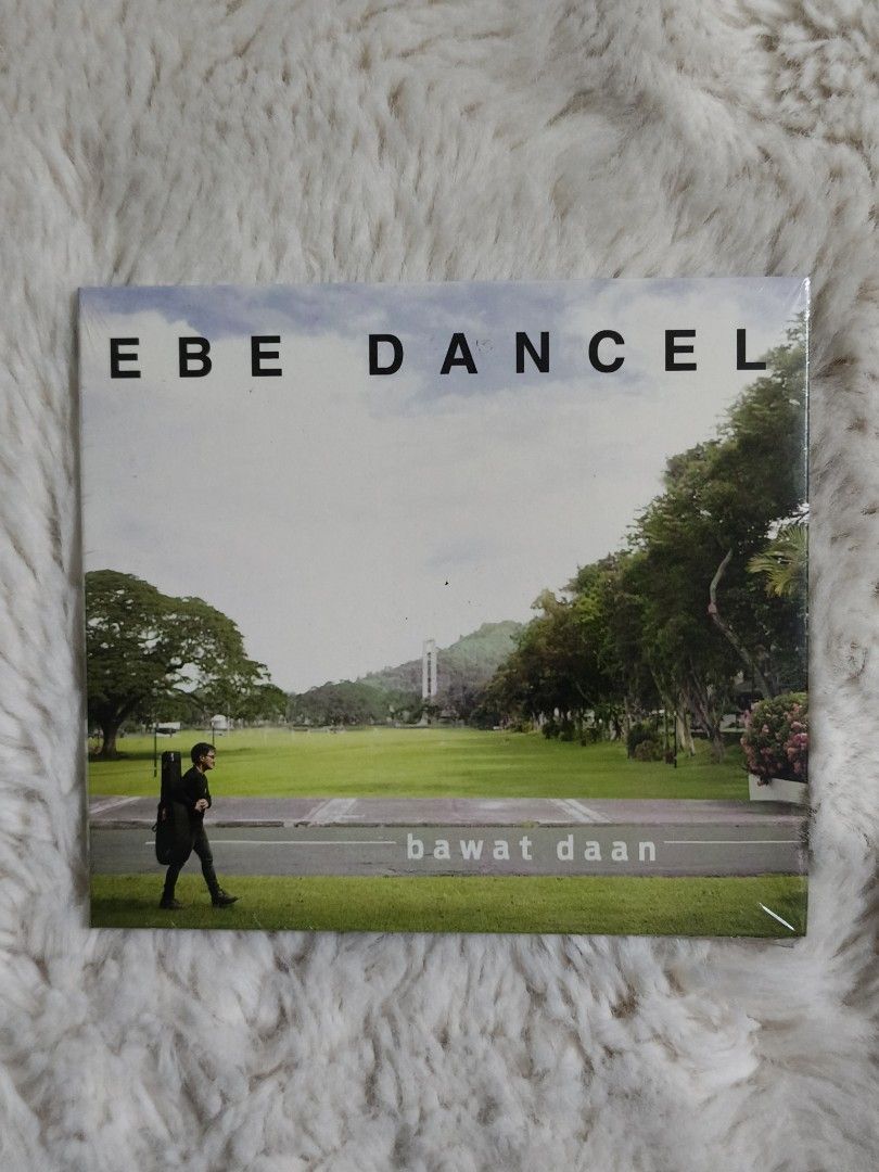 Ebe Dancel - Bawat Daan CD (Category: CDs & DVDs) located in Quezon City. Submitted by kevinfuentes0219 (Listing ID 1411761988, Image 1). Description: Original CD album by Ebe Dancel, titled "Bawat Daan". The album includes tracks like "Bawat Daan", "Kasayaw", "Prom with Yeng Constantino", and more. The CD is still sealed in its original packaging..
