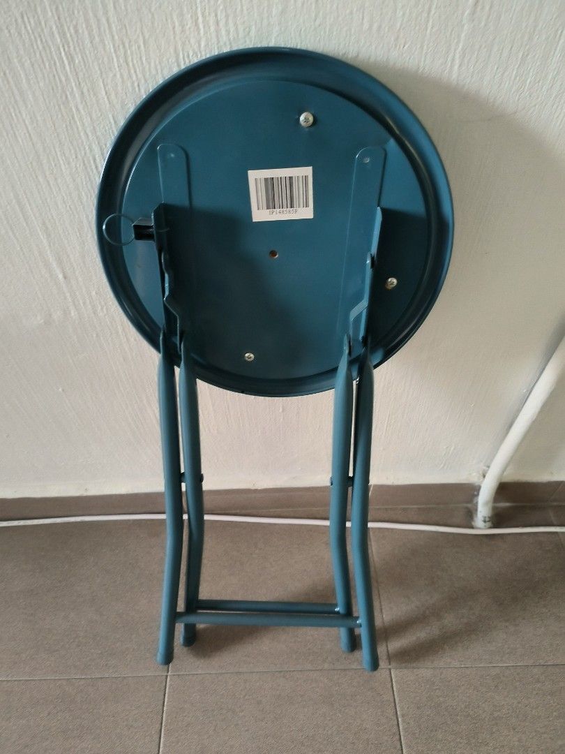Folding Teal Stool (Category: Chairs) located in Singapore. Submitted by 1xstop-shopping (Listing ID 1411677818, Image 3). Description: - Teal folding stool - Lightweight and easy to store - Round, padded seat - Legs fold for compact storage - Perfect for small spaces or occasional use Anyone keen can message me thanks as I have a few and need to clear it to save space thanks. .