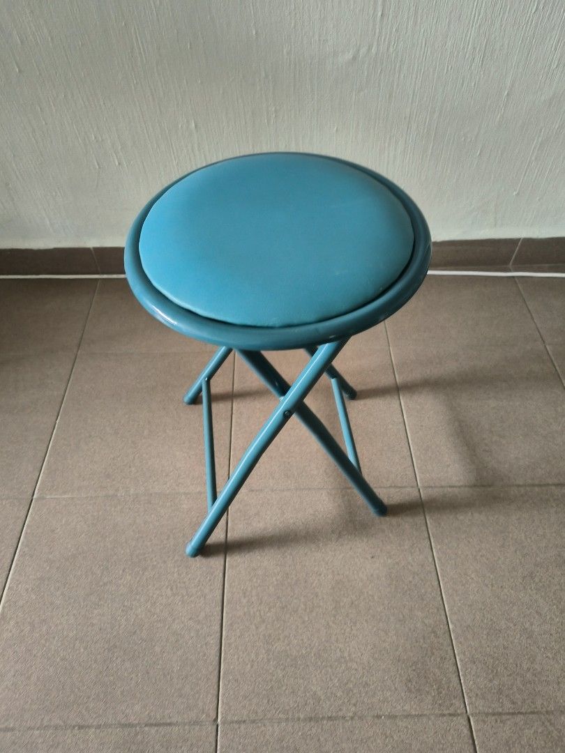 Folding Teal Stool (Category: Chairs) located in Singapore. Submitted by 1xstop-shopping (Listing ID 1411677818, Image 1). Description: - Teal folding stool - Lightweight and easy to store - Round, padded seat - Legs fold for compact storage - Perfect for small spaces or occasional use Anyone keen can message me thanks as I have a few and need to clear it to save space thanks. .