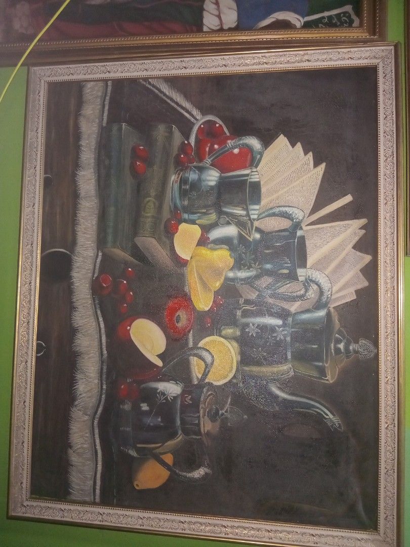 Framed Still Life Painting (Category: Art & Prints) located in Paranaque City. Submitted by chechein_shop (Listing ID 1411710316, Image 1). Description: - Framed still life painting - Depicts books, glasses, and fruits - Dark background - Decorative frame - Unique art piece - Perfect for home decor -Painted at dubai years ago -dm for painting close up.