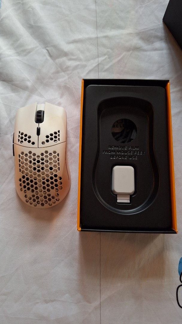 glorious model o wireless gaming mouse (Category: Mouse & Mousepads) located in Vigan. Submitted by cardarco (Listing ID 1411683784, Image 1). Description: orig price 4k comes with box. used to have issues with the scrollwheel, but after checking, the issue seems to be gone. some wear, but not very noticable and doesn't affect feel rfs: unused, need funds meetup around vigan city shipping fee shouldered by buyer.
