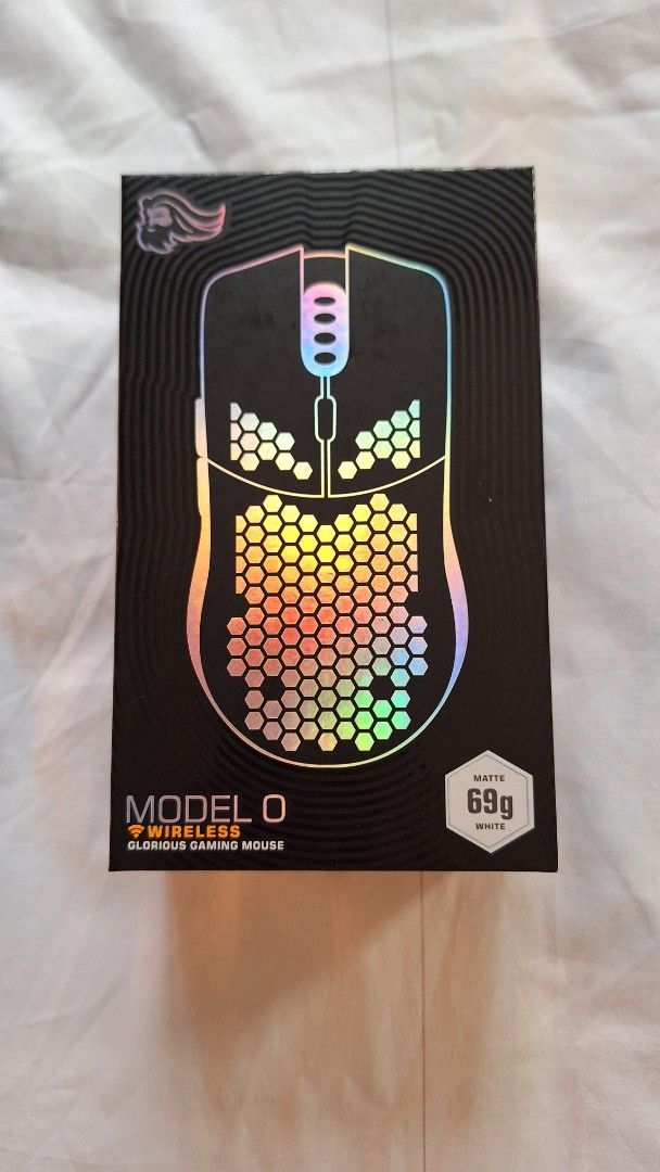 glorious model o wireless gaming mouse (Category: Mouse & Mousepads) located in Vigan. Submitted by cardarco (Listing ID 1411683784, Image 2). Description: orig price 4k comes with box. used to have issues with the scrollwheel, but after checking, the issue seems to be gone. some wear, but not very noticable and doesn't affect feel rfs: unused, need funds meetup around vigan city shipping fee shouldered by buyer.