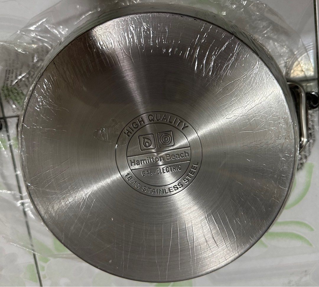 Hamilton Beach 7 QT Dutch Oven (Category: Cookware & Accessories) located in Paranaque City. Submitted by Katgalanto (Listing ID 1411657066, Image 2). Description: - Stainless steel Dutch oven - Encapsulated base for even heating - Oven safe up to 410°F (210°C) - 18/10 stainless steel construction - Stay-cool, riveted handles - Tempered glass lid - Dishwasher safe.
