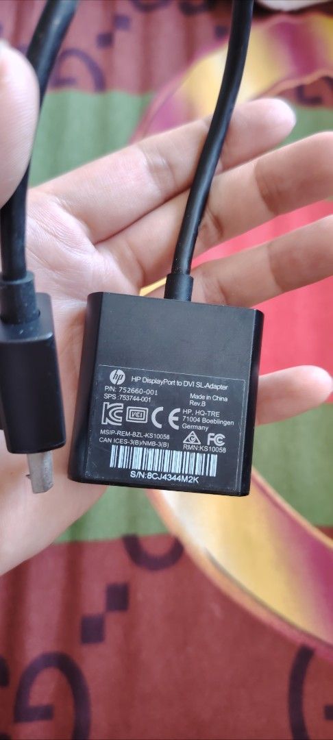 HP DisplayPort to DVI Adapter (Category: Cables & Adaptors) located in Mandaluyong City. Submitted by trisha_001 (Listing ID 1411630186, Image 2). Description: HP DisplayPort to DVI-D adapter. It has a DisplayPort connector on one end and a DVI-D connector on the other. .