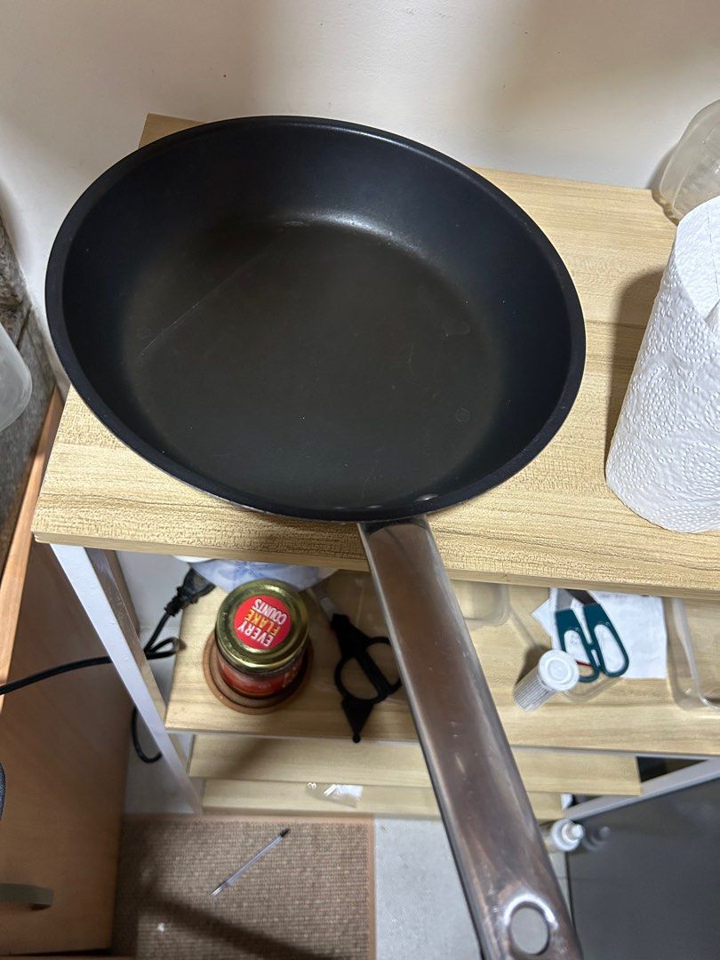 IKEA Non-Stick Induction Frying Pan (Category: Cookware & Accessories) located in Makati City. Submitted by katrinavalle (Listing ID 1411741983, Image 1). Description: - Non-stick frying pan - Long, sturdy handle for easy handling - Dark-colored pan - Glass-center lid with black handle - Suitable for various cooking needs - Ready to use.