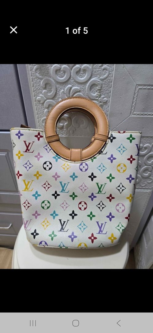 Louis Vuitton Multicolor Tote Bag (Category: Luxury Bags & Wallets) located in Cavite. Submitted by ag20132018 (Listing ID 1411649200, Image 1). Description: - Louis Vuitton Multicolor Tote Bag (Class A) - Features the iconic white background with colorful LV monogram print - Stylish circular wooden handle - Secure zipper closure - Interior with beige lining and Louis Vuitton label.
