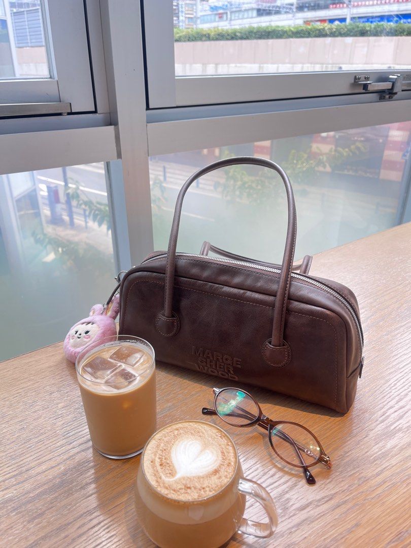 Margesherwood Soft Boston Bag (Category: Luxury Bags & Wallets) located in Quezon City. Submitted by rialynbcg (Listing ID 1411683138, Image 3). Description: Used for my travel abroad Comes with dustbag only Looks darker in person.
