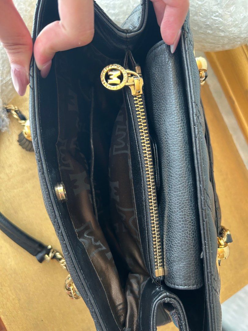Metrocity Leather Quilted Shoulder Bag (Category: Shoulder Bags) located in Paranaque City. Submitted by littlebitsofj9 (Listing ID 1411750353, Image 3). Description: Condition: New Color: Black.