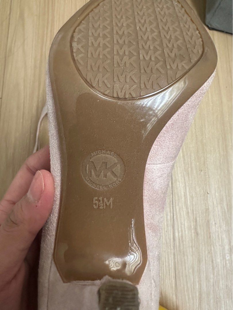 Michael Kors Pointed Pink Toe Heels (Category: Heels) located in Rizal. Submitted by declu77er (Listing ID 1411657510, Image 2). Description: - Michael Kors heels - Soft pink color - Pointed toe - Small heel - Size 5.5M - Michael Kors logo on soles and back - Minor wear on inner sole.