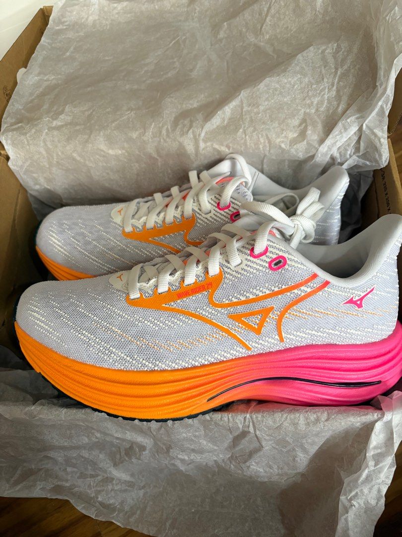 Mizuno Wave Rider 29 Running Shoes Unisex (Category: Sneakers) located in Cainta. Submitted by preloved.rlm (Listing ID 1411645310, Image 1). Description: - Mizuno Wave Rider 29 Unisex - Size: US 6.5, EUR 38.5, CM 24.5 (female size 8) - Color: White, Orange, Pink - Includes original box, receipt, and shopping bag. price sticker in box still intact - Purchased in megamall branch - original price in tag: Php 9,290 rfs: i dont run asking price: 5,00