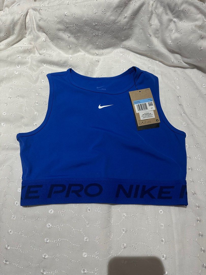 Nike Pro Sports Bra (Category: Activewear) located in Muntinlupa City. Submitted by stuffbya (Listing ID 1411716667, Image 1). Description: - Nike Pro Sports Bra - Size: M - Color: Blue - Excellent condition/NEVER USED - Features Nike Pro branding - Ideal for workouts and active lifestyles.