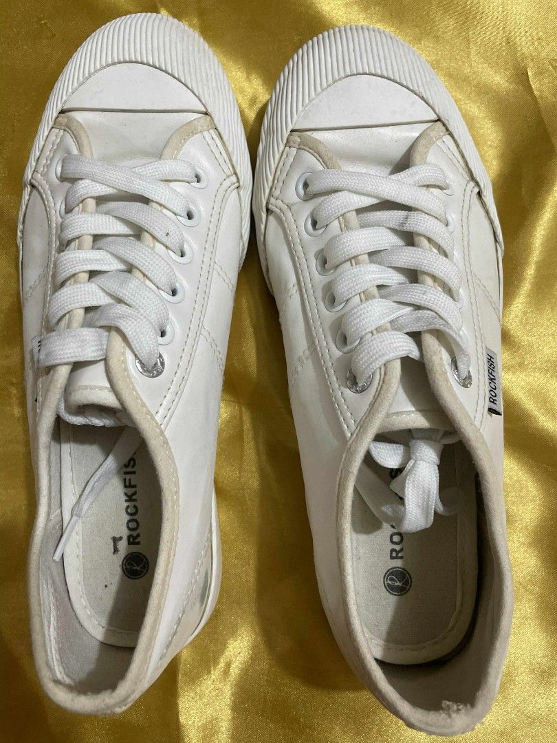 Rockfish White Sneakers Size 6/39 (Category: Sneakers) located in Manila. Submitted by klebpreloved (Listing ID 1411747378, Image 3). Description: - White Rockfish sneakers - Size: 6/39 - Lace-up design - Rubber toe cap - Rockfish logo on side and insole - Made in China Pre-loved shoes with minimal signs of usage and little flaws on the shoe itself. Color may vary due to lighting of the camera. It is in great condition and clean, ready to use. Fo