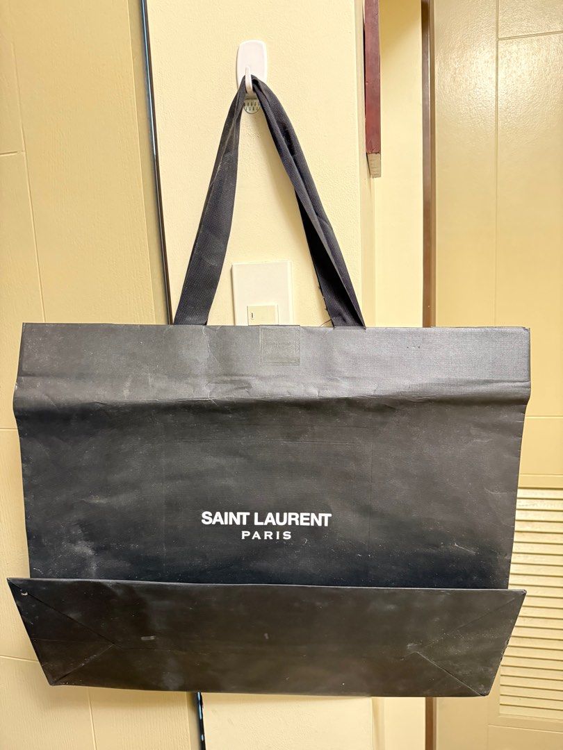 Saint Laurent XL paper Bag (Category: Looking For) located in Pasig City. Submitted by davedeleon (Listing ID 1411708199, Image 2). Description: Original Saint Laurent paper bag Size: W 22" x H 18.5" No issues No trade Price excludes SF.