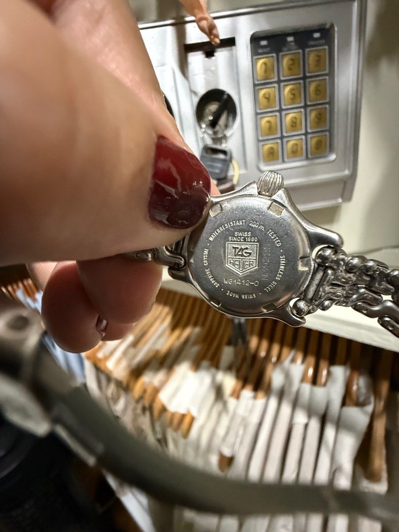 TAG Heuer Professional 200m Watch (Category: Luxury Watches) located in Dumaguete. Submitted by thethingsiloved. (Listing ID 1411753671, Image 3). Description: - TAG Heuer Professional watch - Silver-toned bracelet - White dial - Rotating bezel - Date display - Water resistant to 200m - Sapphire crystal - TAG Heuer clasp.